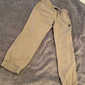 Hurley wind-breaker style joggers for a boy.